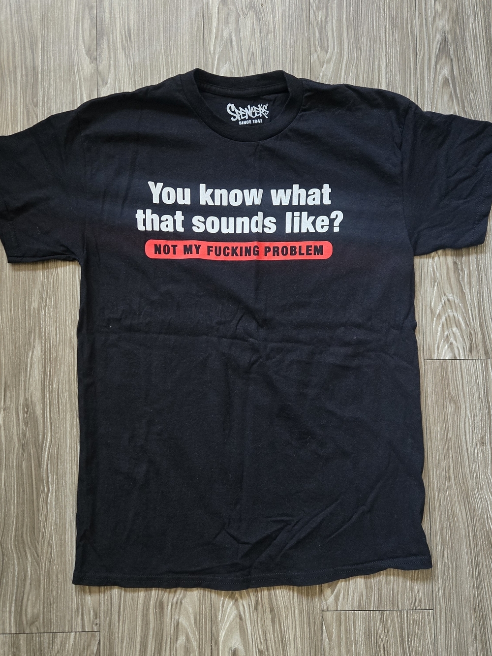 Spencer's Black Tee with White and Red Text